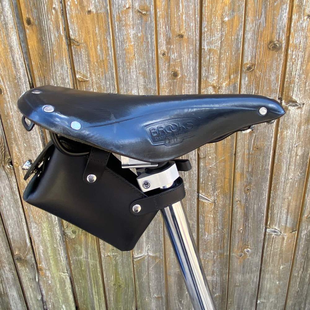 Black bicycle saddle bag with silver hardware sideview