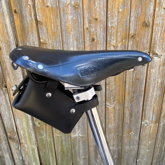 Black bicycle saddle bag with silver hardware sideview