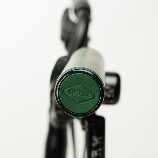 Brompton Leather Grips Unibody Souma Leather green color leather logo close-up, white background