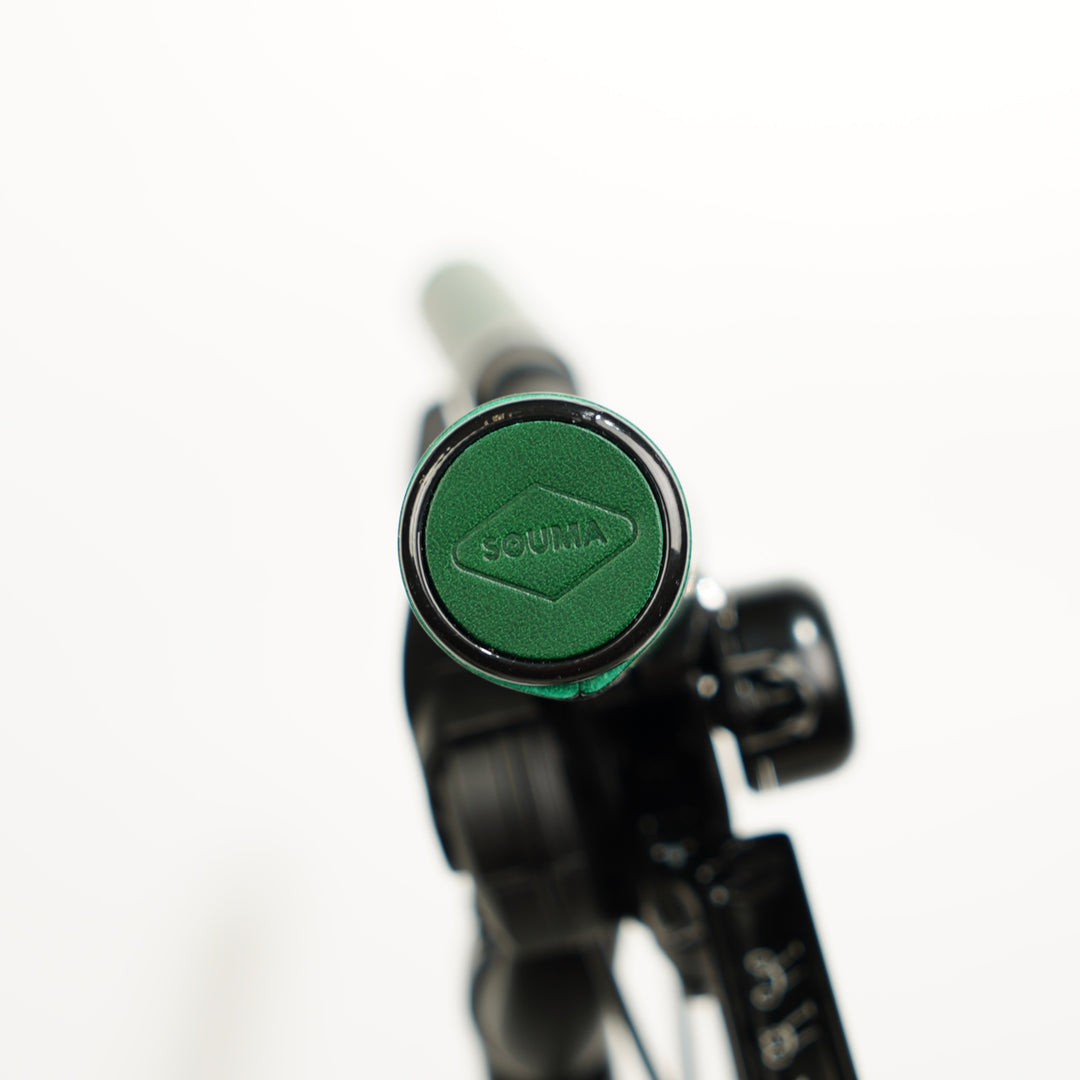 Brompton Leather Grips Unibody Souma Leather green color leather logo close-up, white background, different angle