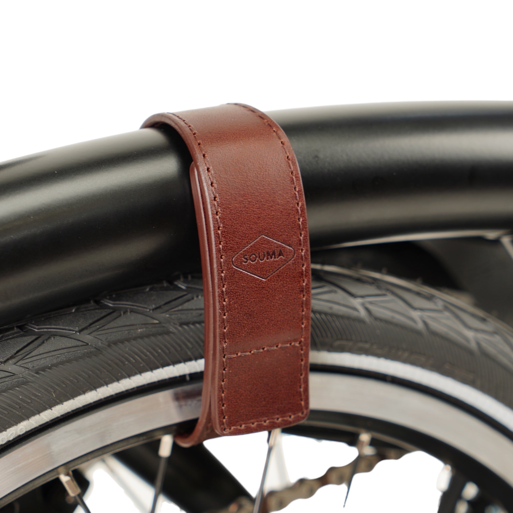 Leather  Brompton Wheel Frame strap and Trouser Strap, pants strap, brown colour close-up, rotated