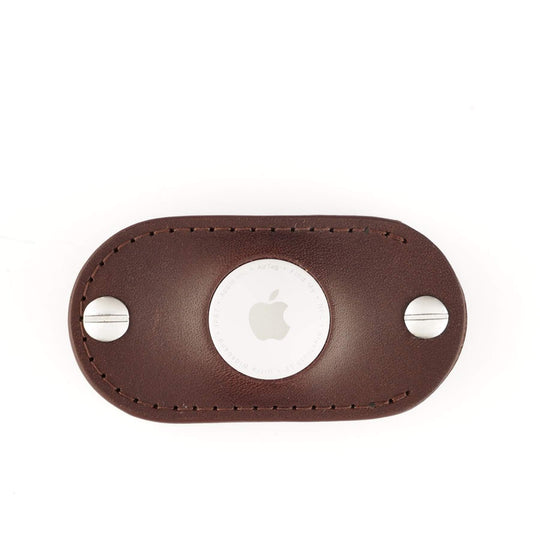 Brown leather AirTag organizer on a white background