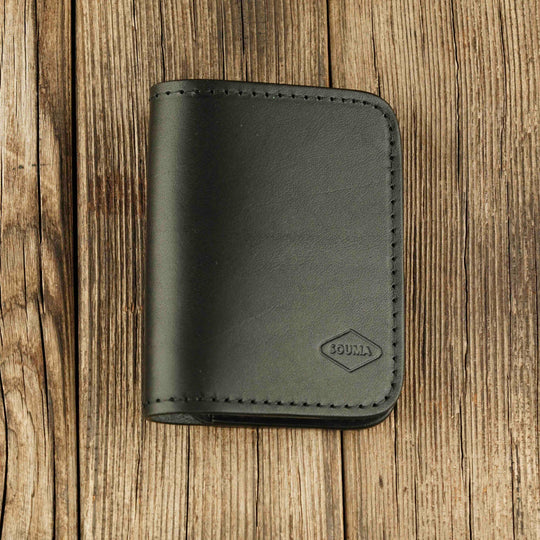 Bifold Apple AirTag Leather Wallet Black wooden background