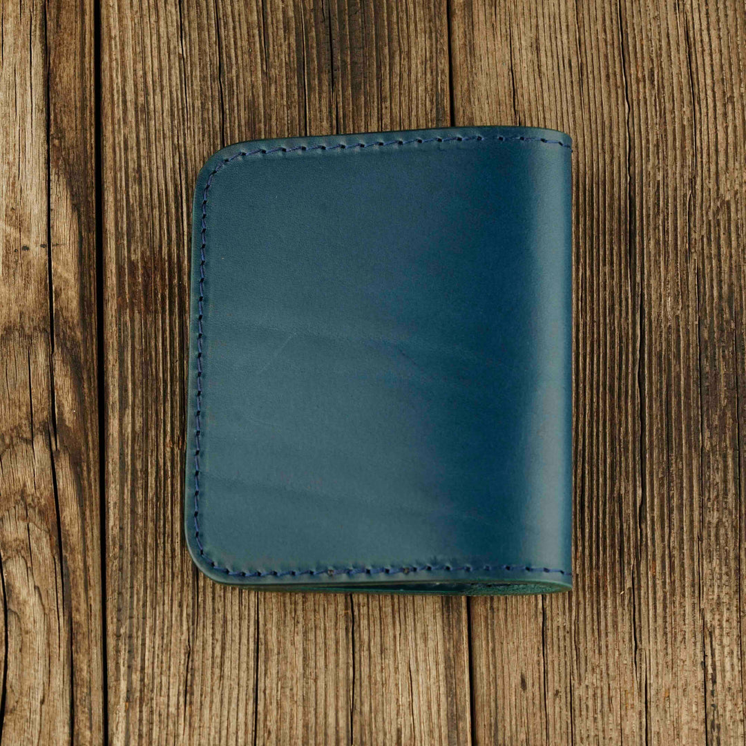 Bifold Apple AirTag Leather Wallet Blue wooden background, back side