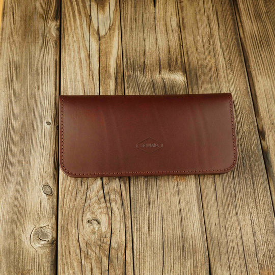 Women's Leather Wallet - Fold Souma Leather Brown, closed, wooden background