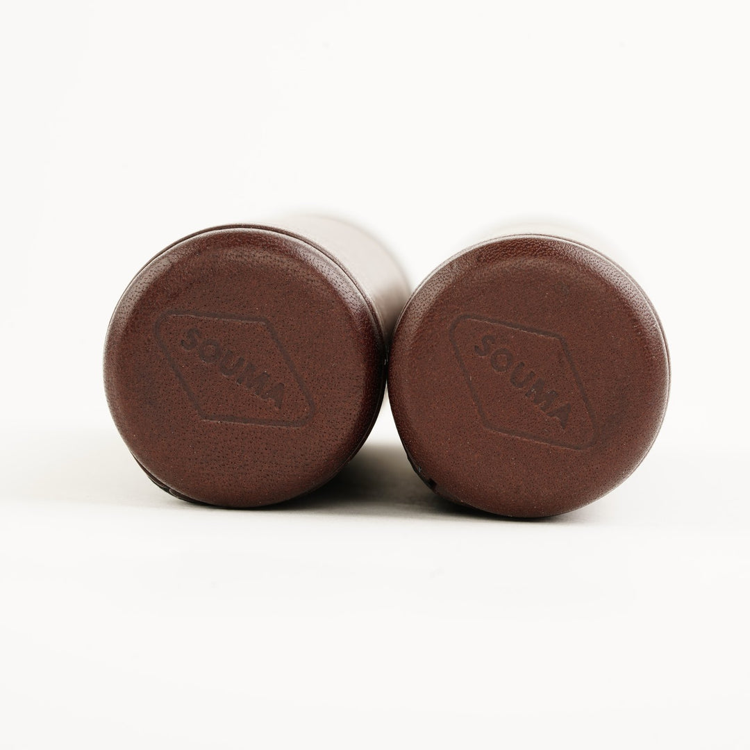 two brown leather grips front view