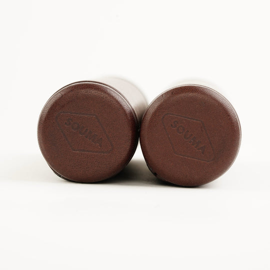 two brown leather grips front view