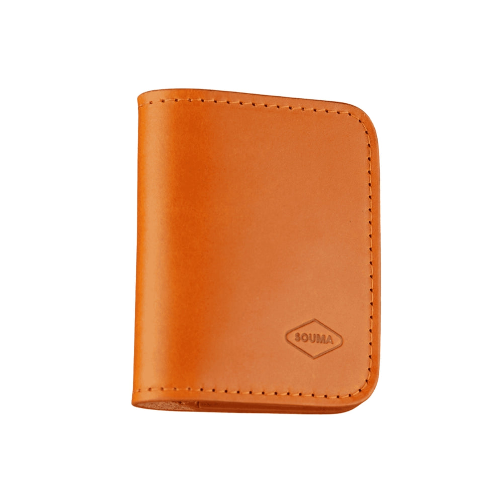 Honey leather Apple Airtag wallet with a logo on a white background
