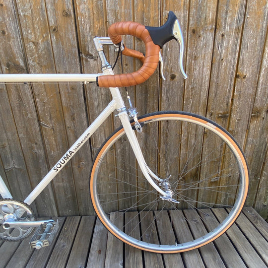 Bicycle and Leather handlebar tape side view