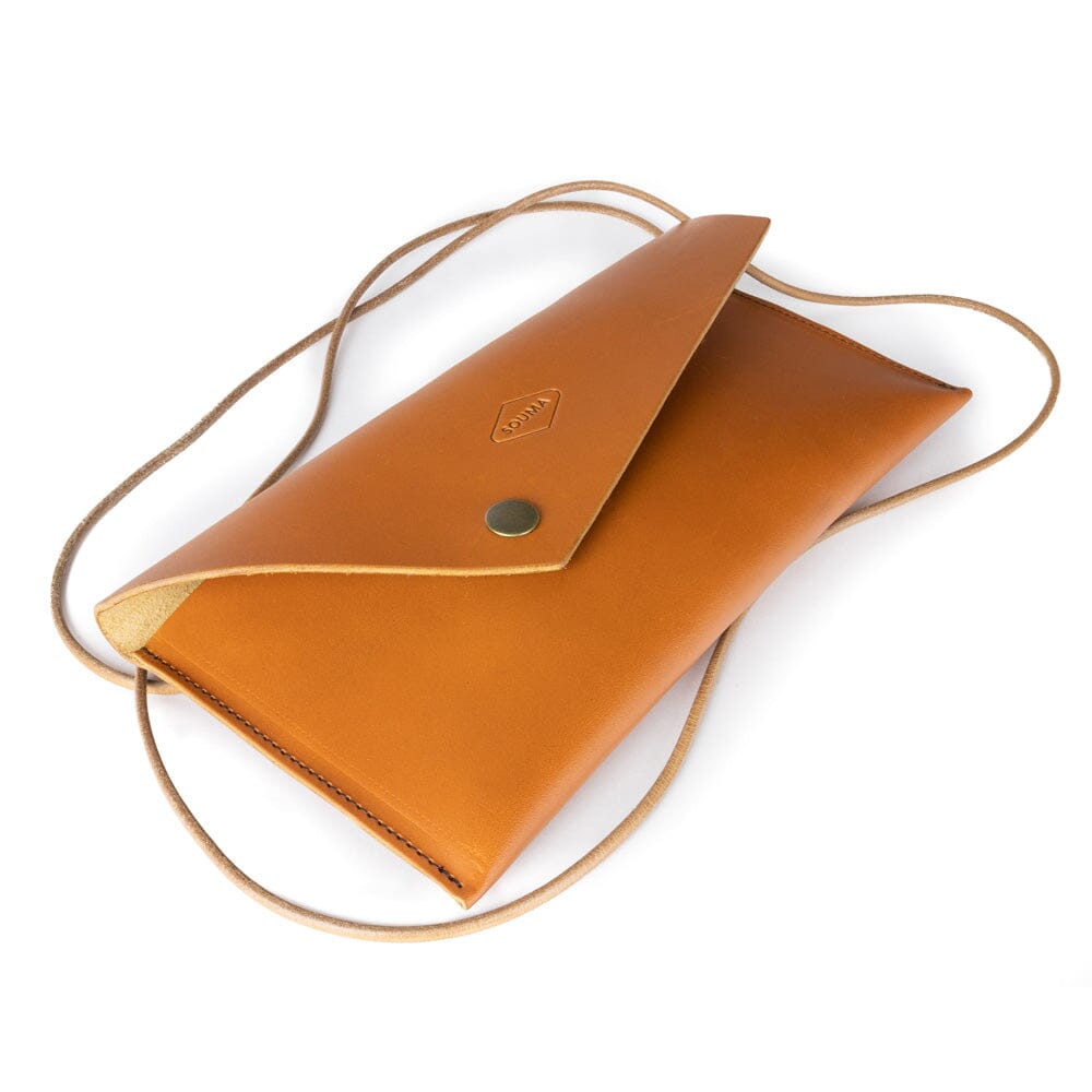 Women's leather clutch - Marc Souma Leather on white background